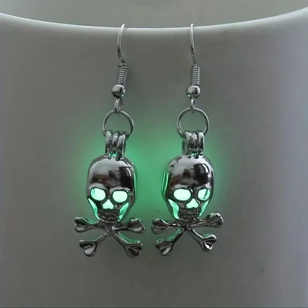 Luminous skull, head dangle earrings.Alloy material, measurements, and pictures.